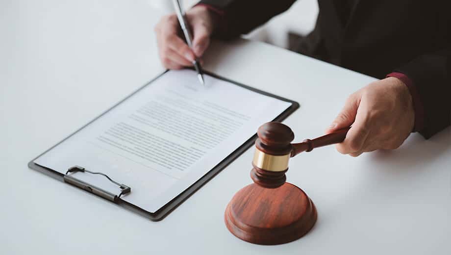 Signing Documents To Make A Deal With The Prosecutors