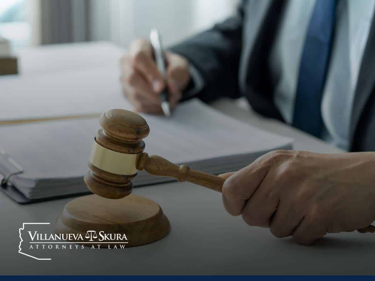 Gavel on a table with attorney in the background, symbolizing legal proceedings in sex trafficking cases