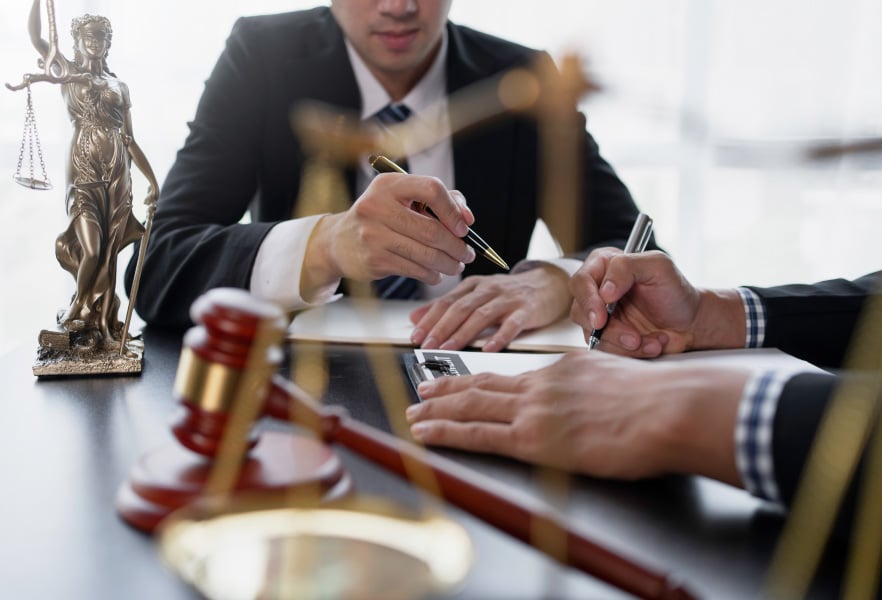 Team of Attorneys Taking Notes On A Sex Crime Case
